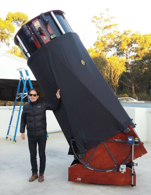 STARGAZING: ASV President Perry Vlahos with the telescope. Picture: ASV. 