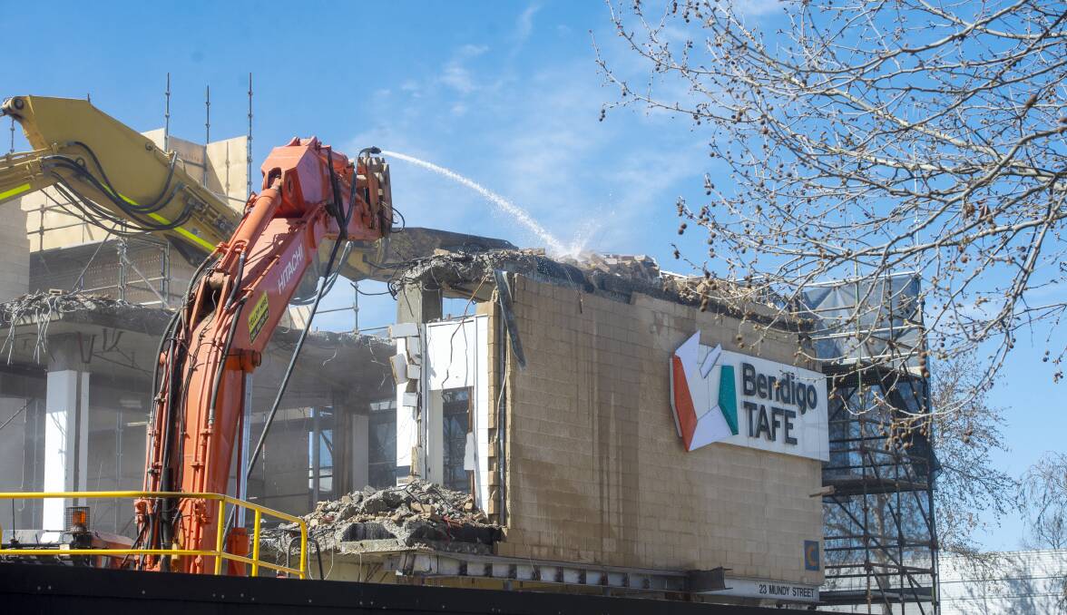 ACTION: Bendigo TAFE's building C, or the former Ted Thompson building, was demolished this week. Picture: DARREN HOWE