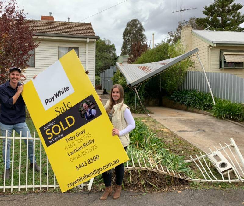 First home buyers Darcy Holbrook and Molly Lea with their new house. Picture: RAY WHITE BENDIGO