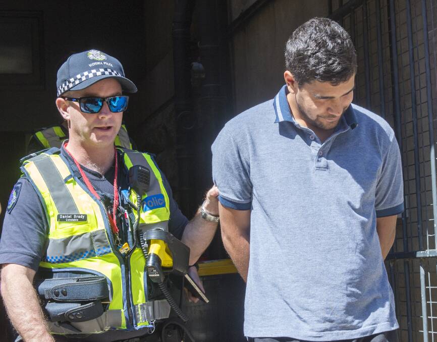IN COURT: Jaawaa Morgan is led from the Bendigo County Court in October 2018 after pleading guilty to a home invasion. Picture: DARREN HOWE.
