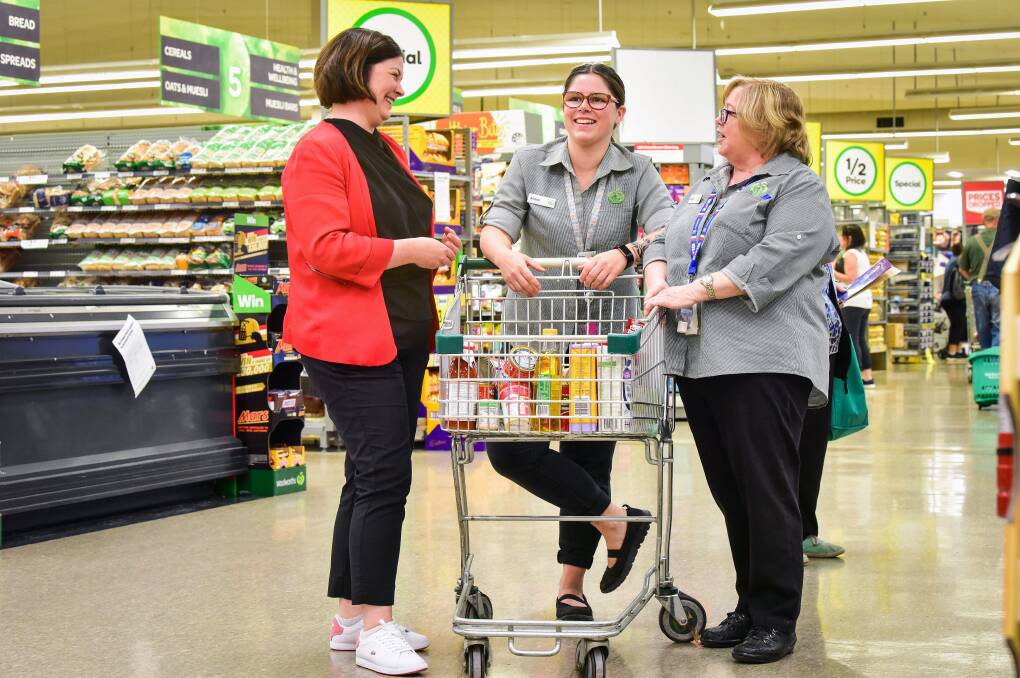 ACTION: Federal Member for Bendigo Lisa Chesters with Woolworths Bendigo Marketplace employees Amber Leed and Angela Parker. Picture: BRENDAN MCCARTHY