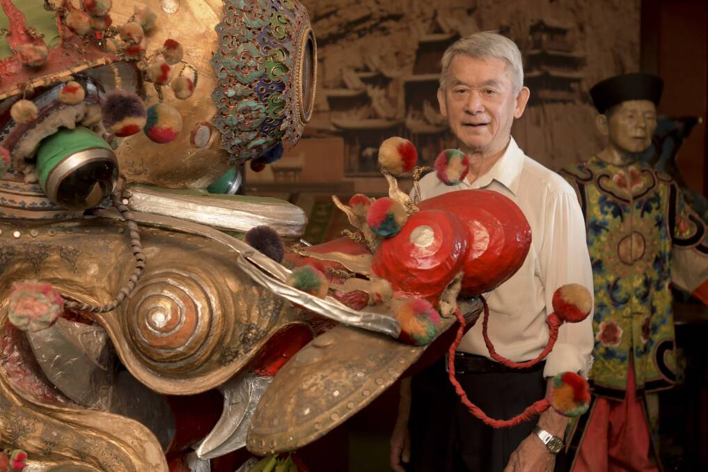 BOWING OUT: Golden Dragon Museum director Russell Jack with the oldest Chinese dragon in Bendigo, Loong. Picture: NONI HYETT