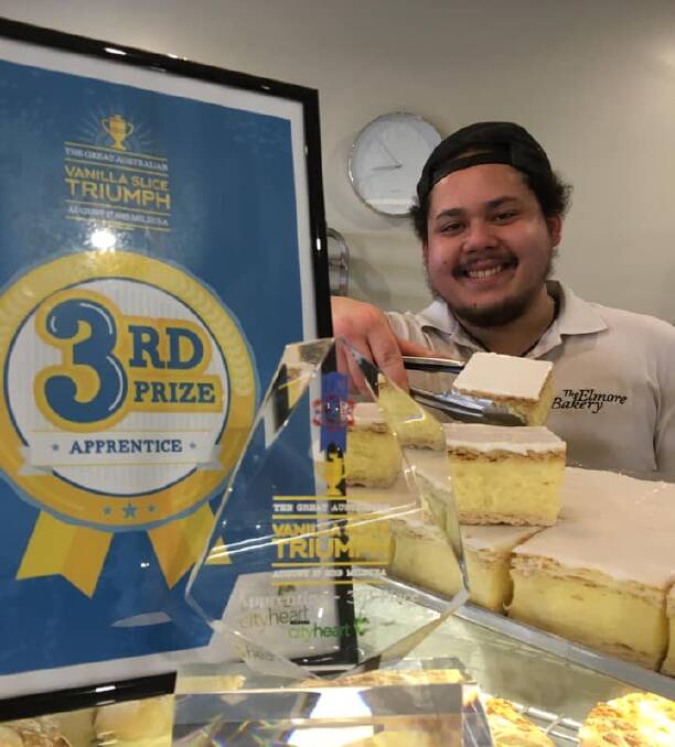 Elmore Bakery apprentice Sam Billett with his award winning vanilla slice. Picture: TRAVIS WILSON 