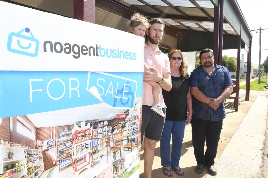 ACTION: Colbinabbin resident Matt McEvoy, left, with general store owners Darren Morante and Shirley-Anne Hughes. Picture: NONI HYETT