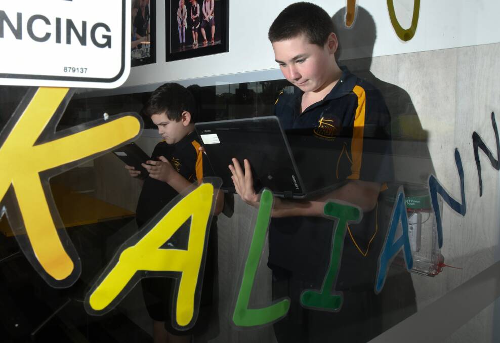 ENGAGE: Kalianna School Bendigo students Nigel Wybar and Jaxson Divola are using online resources for classes. Picture: NONI HYETT