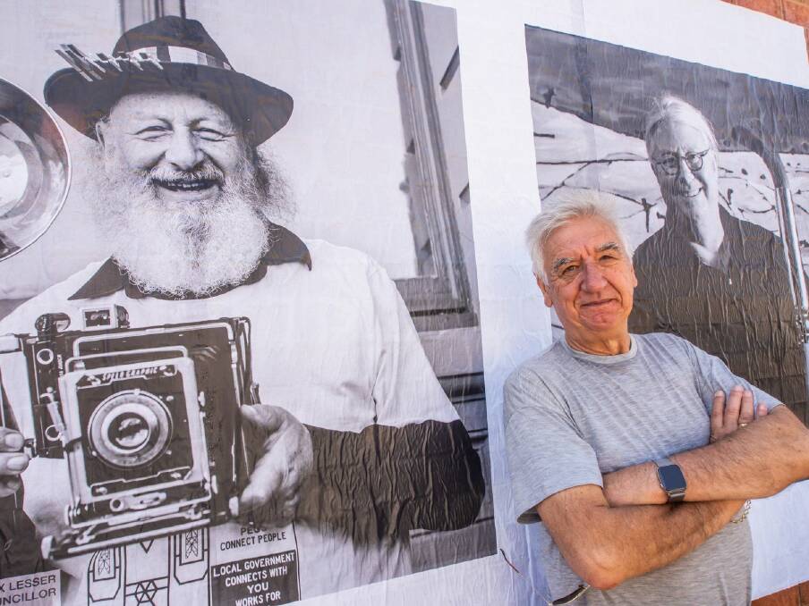 One of the MAPgroup photographers who helped install the paste-ups in Castlemaine. Picture: DANIEL SACCHERO