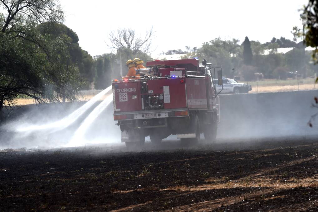  Fire crews blacking out one of the December 2019 fires caused by Scott Hagley, 36, Justin Hagley, 38 and Andrew Valli, 32. Picture: DARREN HOWE