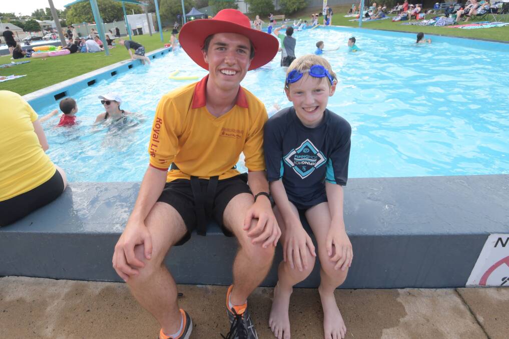 Golden Square Pool president Sam Kane with junior volunteer Henry Coaxley. Picture: NONI HYETT