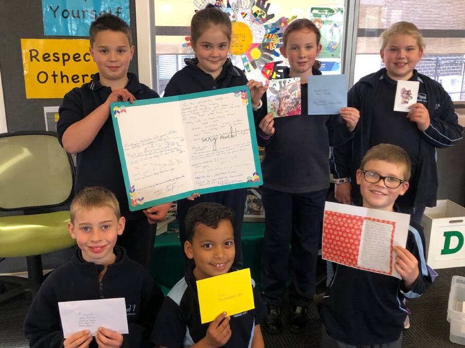 SUPPORT: Holy Rosary Primary School students Levi Fountas, Kayla Bell, Maddi Gregory, Rubi Morrison, Jack Leech, Xander Baerken, and Charlie Boland were excited to receive the letters. Picture: SUPPLIED