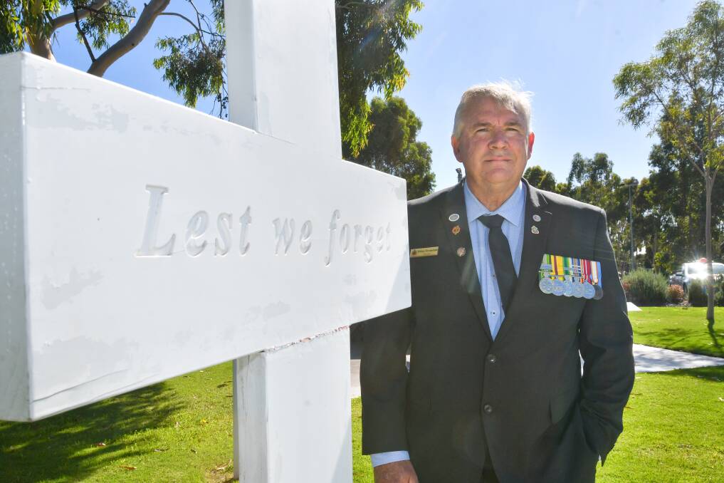 AT WORK: Bendigo District RSL Sub Branch president Peter Swandale is trying to find a solution. Picture: NONI HYETT