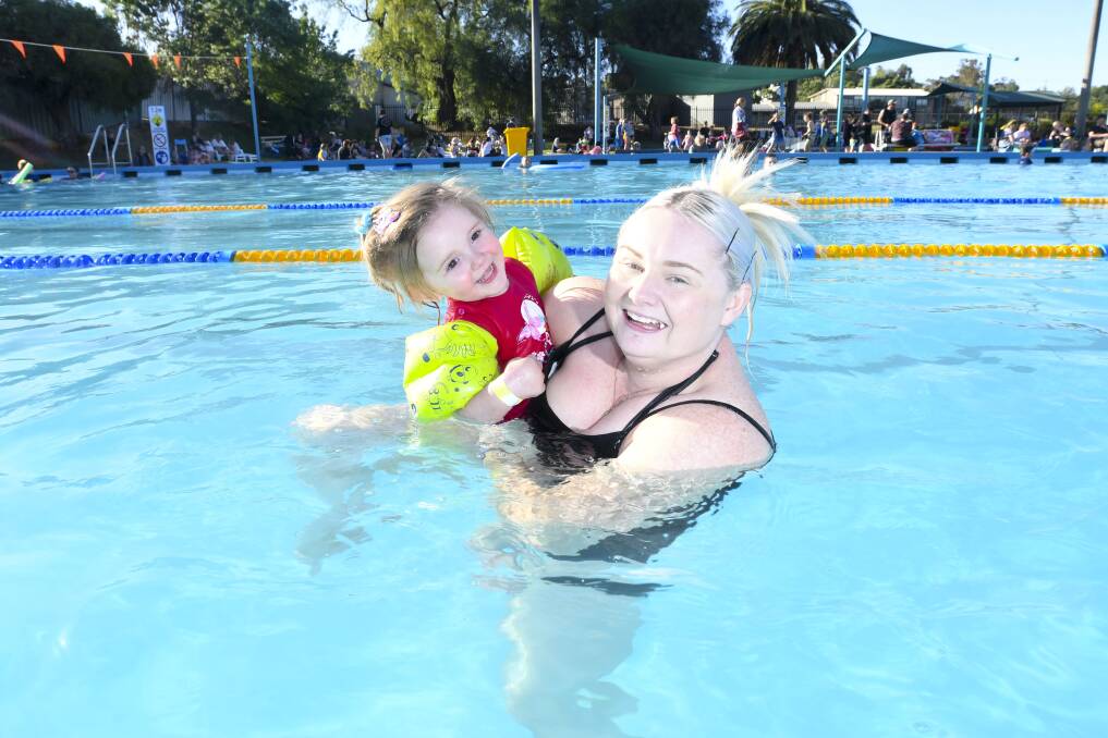 Emily and Tiffany Lazenby enjoyed last year's New Year's Eve party at the Golden Square Pool. Picture: NONI HYETT
