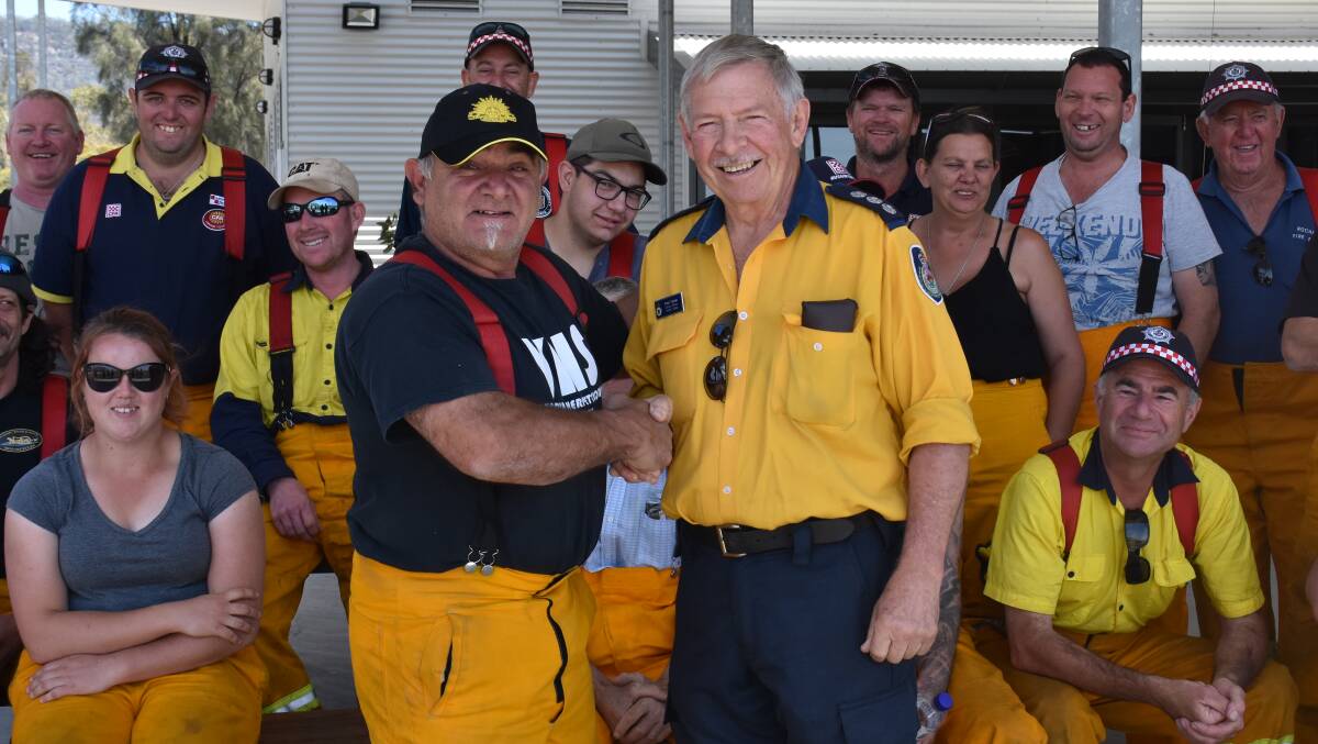 THE FOLLOWING MORNING: George Calleja (Bamawm Extension Fire Brigade captain) and Fred Turner (NSW RFS group officer Hunter Valley) pictured at the Hunter Valley RFS head quarters on Wednesday morning.