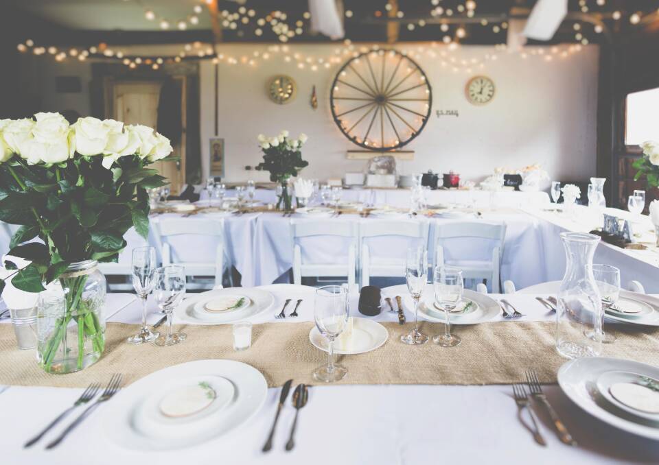 CHIC: The styling was chic, provincial and vintage. The colour scheme could be described as whites, woods, and twine, with beautiful white roses adorning the location.