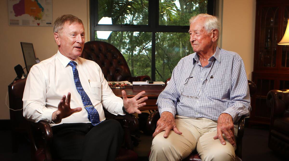 Local news axed: WIN TV owner Bruce Gordon with his regional network's newsreader, Geoff Phillips.