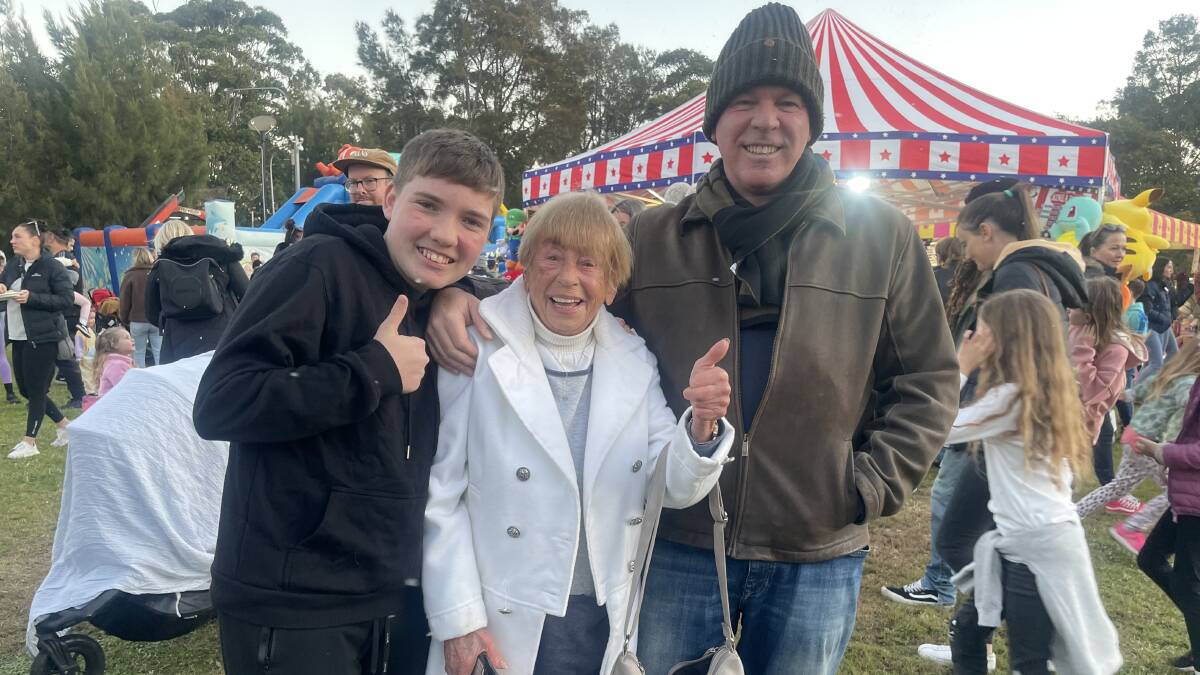 Miles and his father Kelvin, with (centre) Aranka spending time together at a market after the show finished. Picture supplied