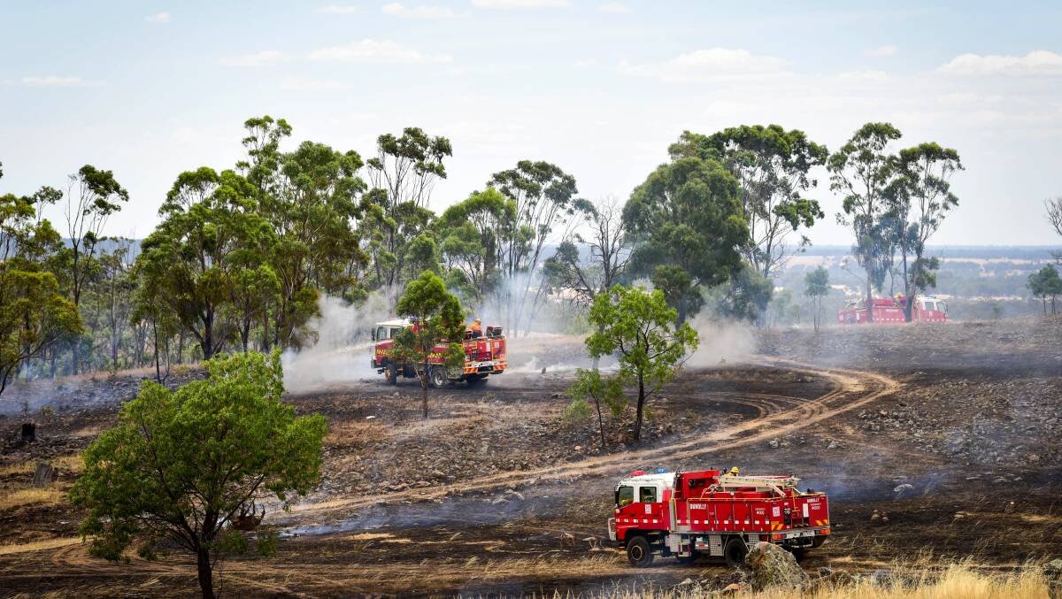 Country Fire Authority trucks attend a fire near Moliagul in January, which burnt about 150 hectares of land. Picture: BRENDAN McCARTHY