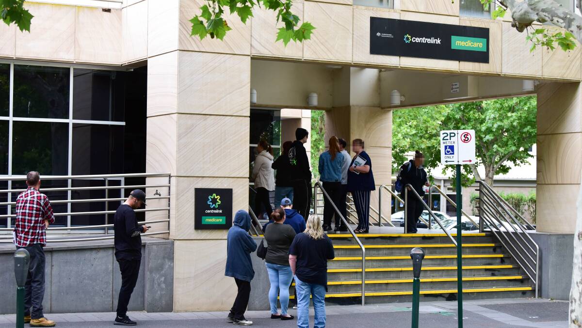 Unemployment queues outside the Bendigo Centrelink office in March. Picture: BRENDAN McCARTHY