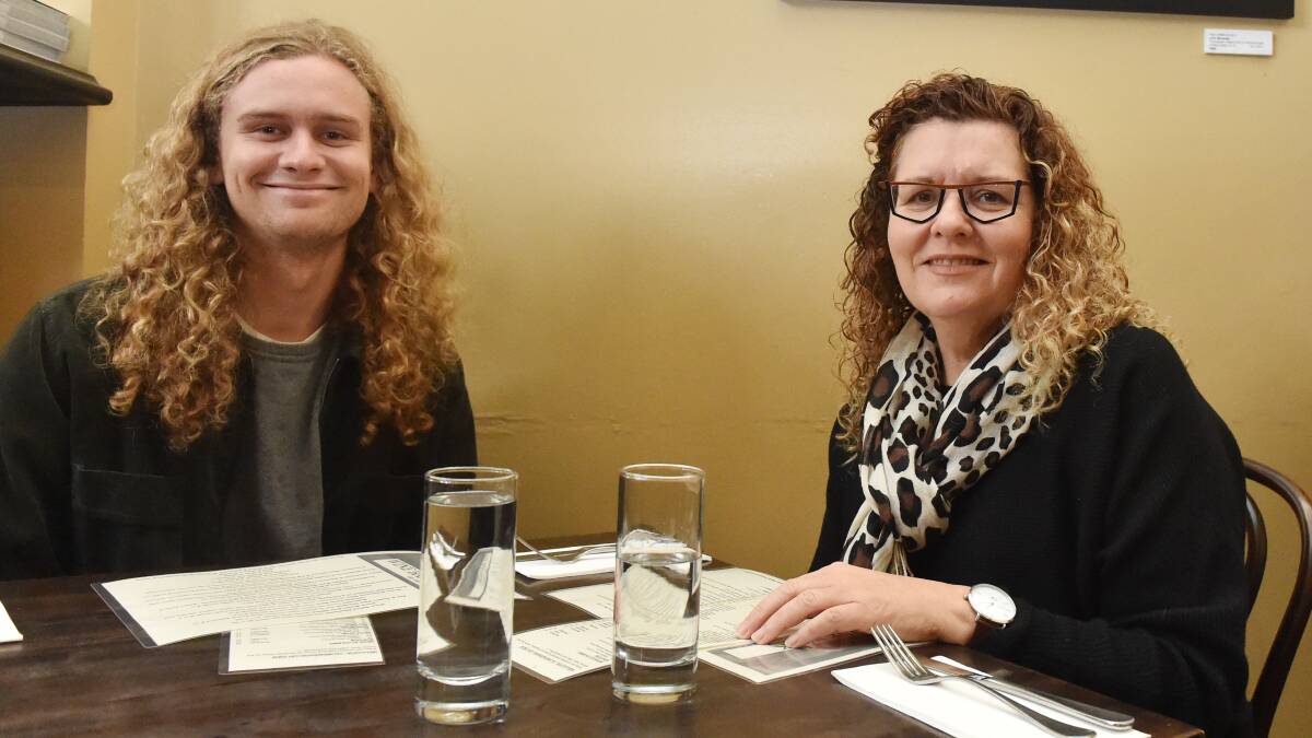 Wine Bank patrons Jesse Bradford and Karen Pritchard enjoy the eased restrictions. Picture: DARREN HOWE