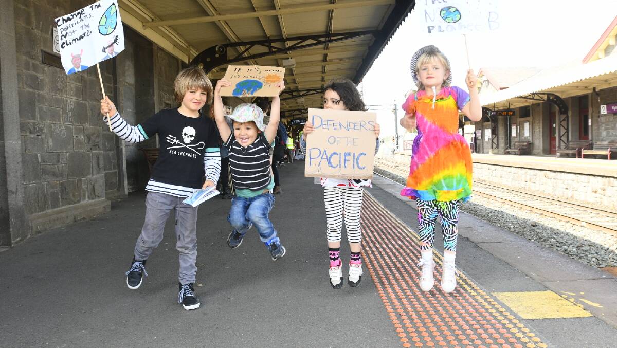 Children travel to Melbourne for the school strike. Picture: NONI HYETT
