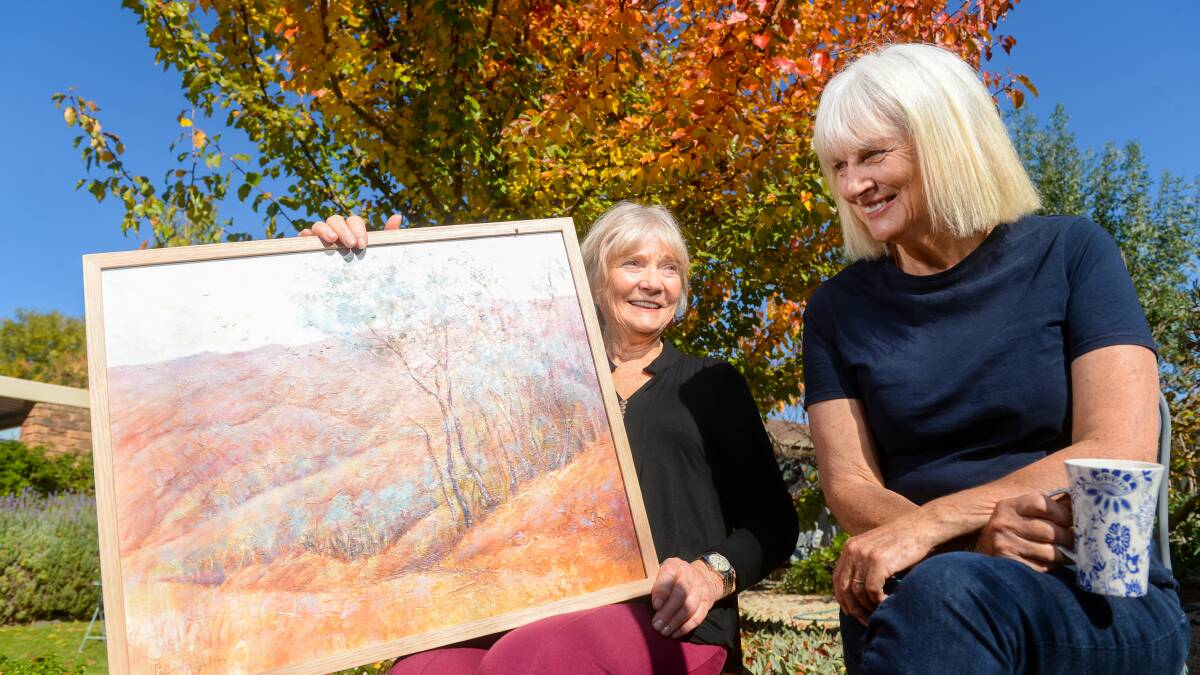OPEN DOORS: Belinda John and Joan Halpin are holding an exhibition on the Mother's Day weekend, to show off years worth of artwork the two neighbours have created. Picture: DARREN HOWE