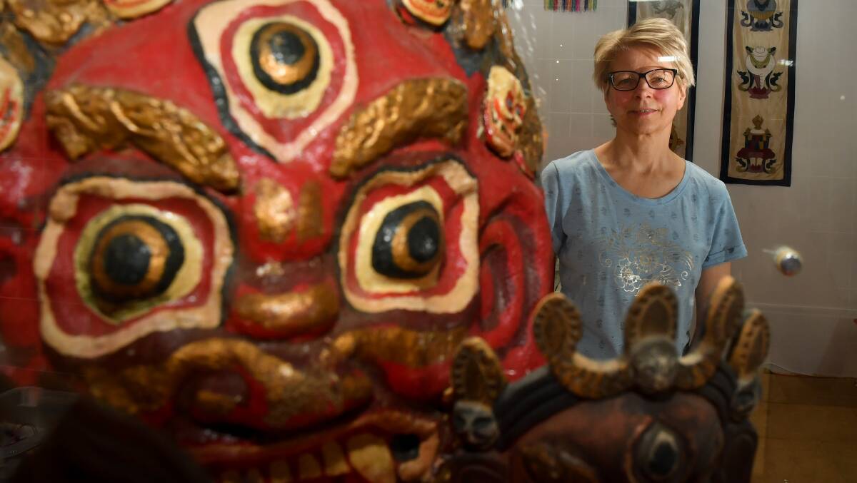 LOVING LABOUR: Great Stupa librarian Barb Rozmus has curated the exhibition with fellow volunteers. Picture: NONI HYETT