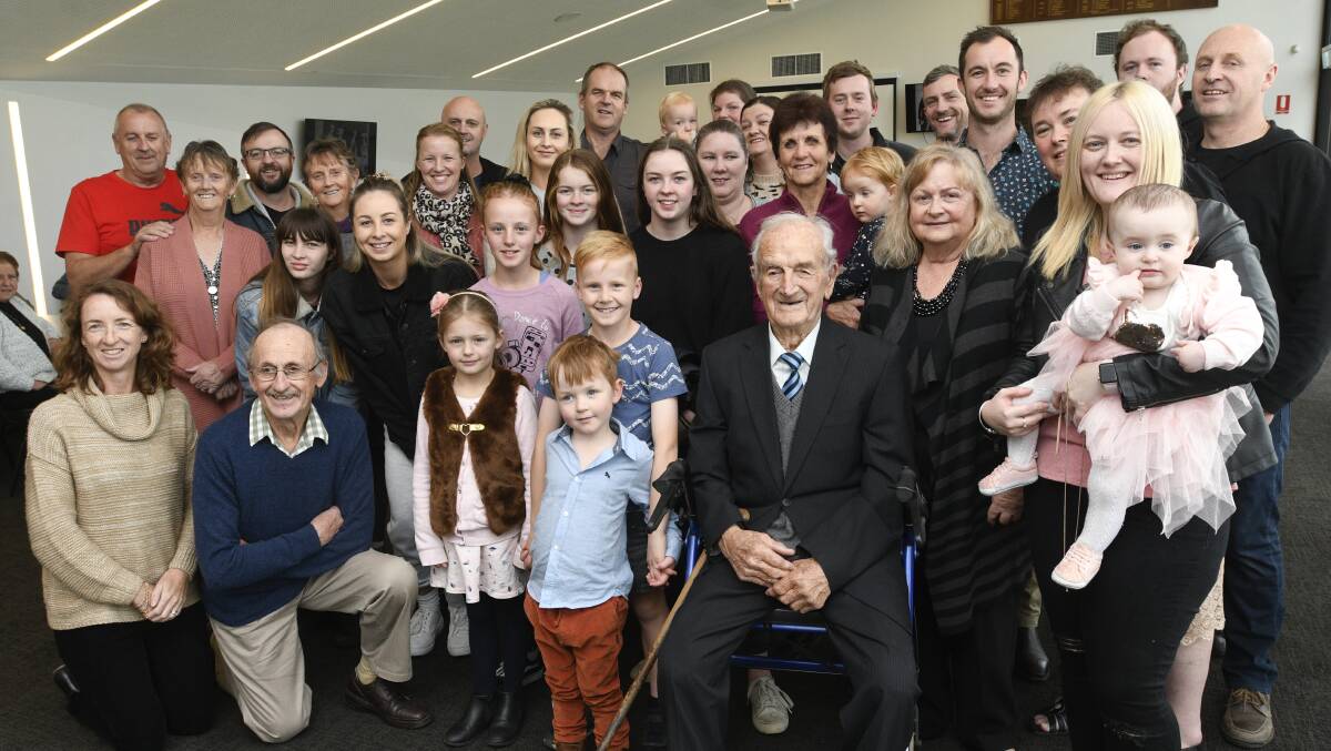 Harold Toma with his family at his 103rd birthday party in 2019. Picture: NONI HYETT