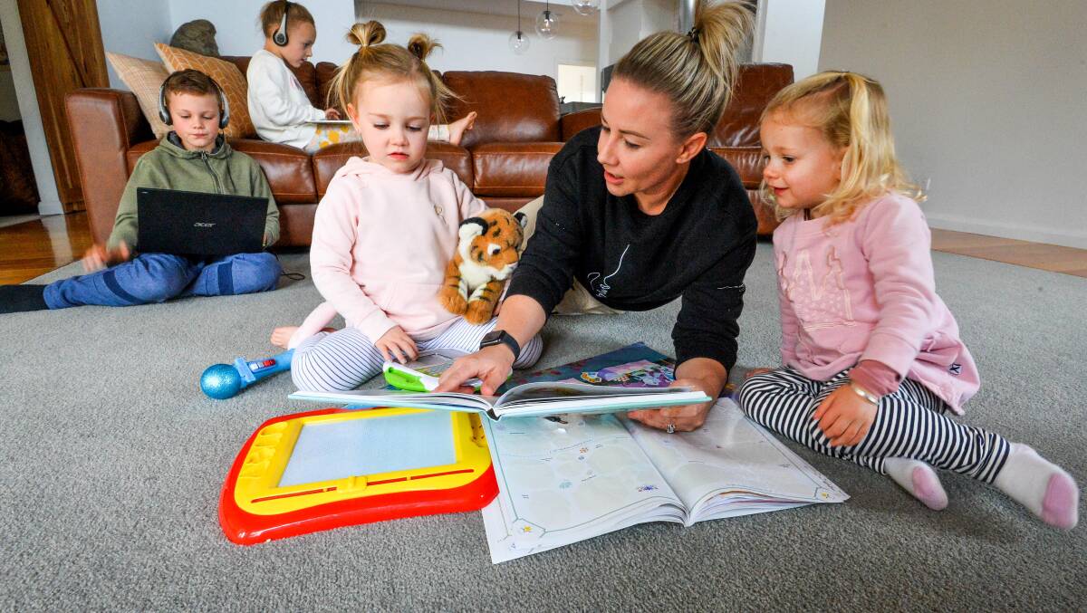 Michaela Woolley is struggling to divide her time between her two school children and two toddlers. Picture: BRENDAN McCARTHY