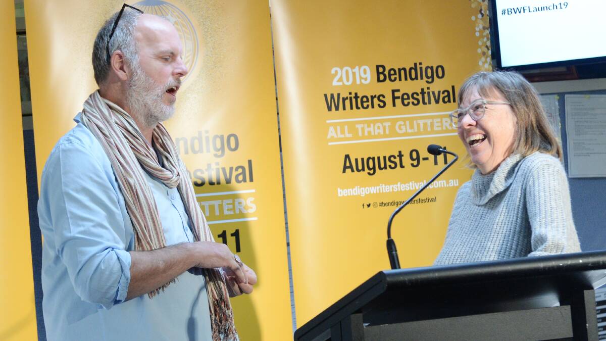 Bendigo Writers Festival ambassador Greg Fleet speaks with director Rosemary Sorensen at the launch. Picture: DARREN HOWE