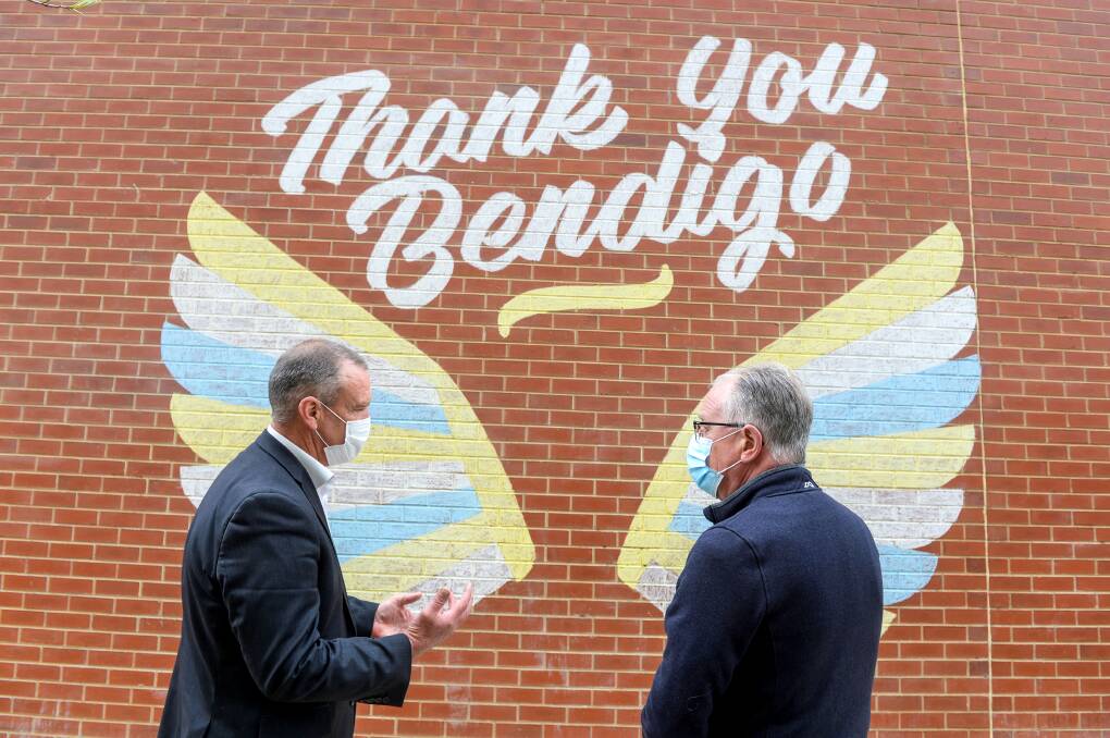 BIG EFFORT: City of Greater Bendigo chief executive Craig Niemann and Bendigo Health chief executive Peter Faulkner thanked the community. Picture: DARREN HOWE
