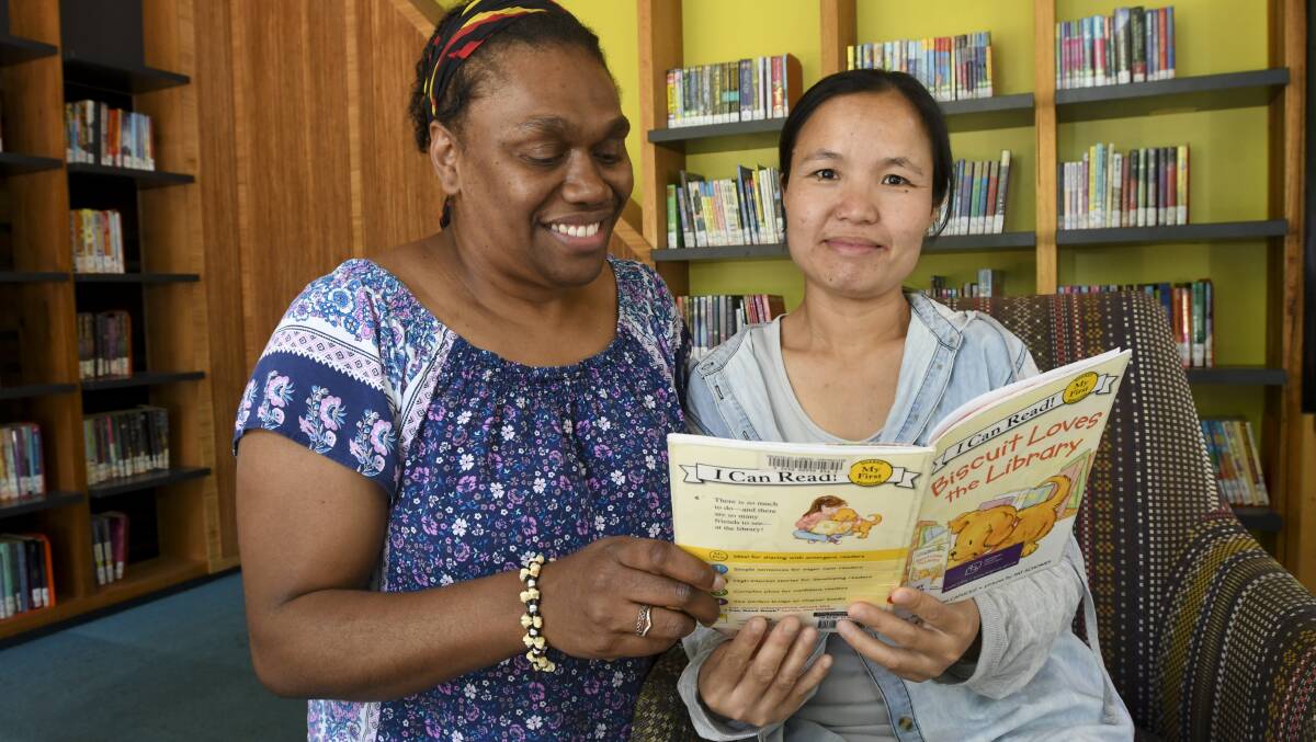Mu Ka and Simaima Tavil-Melachon in their corner at Bendigo library. Pictures: NONI HYETT