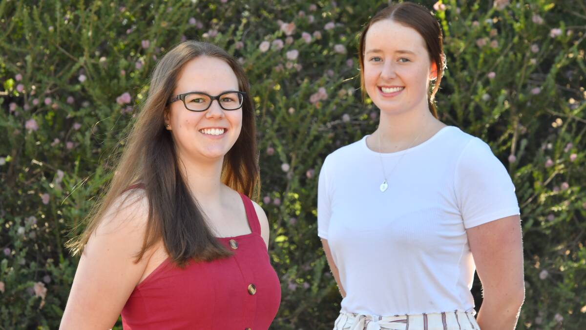 Gemma Ritchie and Brianna Harris were among the year 12 graduates to receive university offers. Picture: NONI HYETT