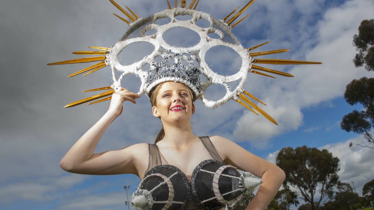 CREATIVE CHALLENGE: Julia Rosia grazes the sky modelling a headpiece. Picture: DARREN HOWE