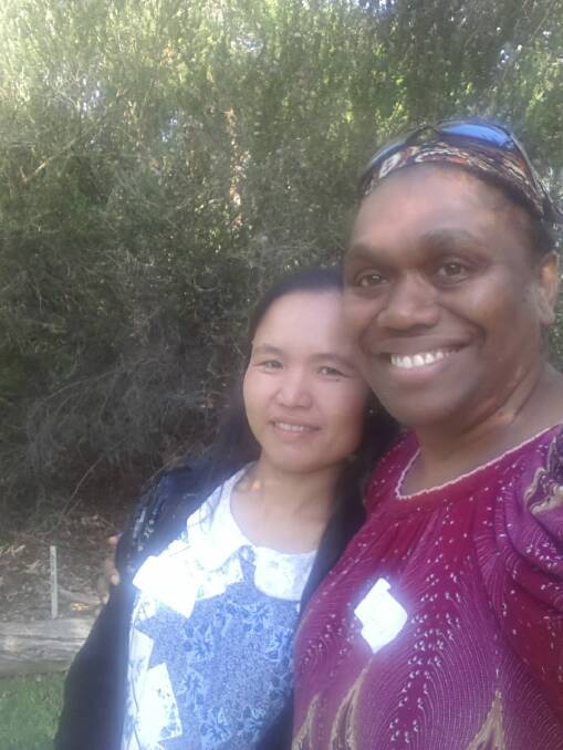 Mu Ka and Simaima Tavil-Melachon at an Adult Migrant English Program event. Picture: supplied