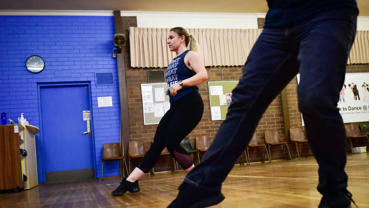 Dance instructors Leah Borchard and Andrew White teach a class online. Picture: BRENDAN McCARTHY