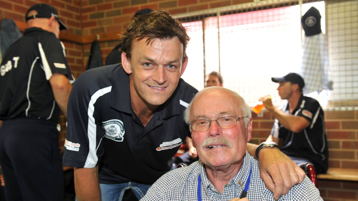 John Forbes pictured with cricket great Adam Gilchrist in Bendigo. Picture: supplied