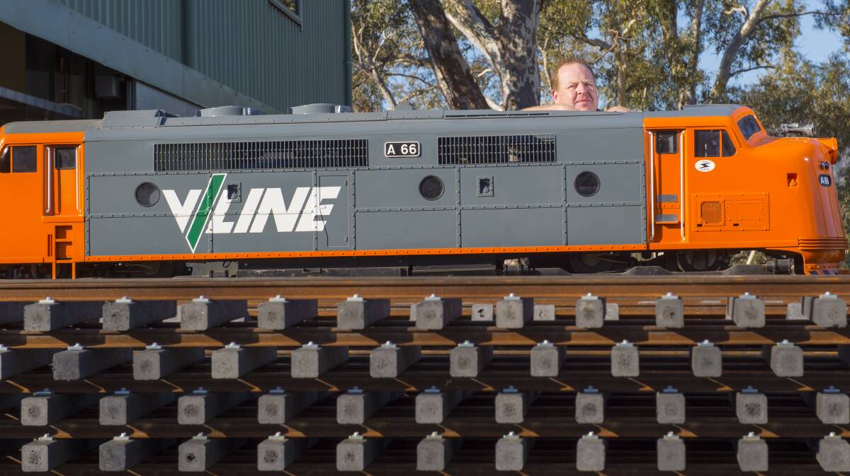 LINE LAYING: The railway tracks are made in Switzerland and laid by hand. Picture: DARREN HOWE