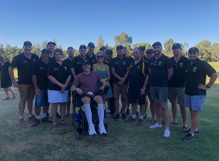 HELPING OUT: Jackson Davie with members of Uniting Cricket Club. Picture: supplied.