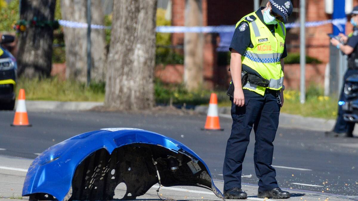 Police at the scene of the crash on Monday morning. Picture: DARREN HOWE