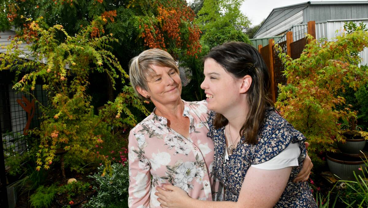 CHANGE FEARS: Kim Fairbairn Baker with daughter Jayde Baker, Ms Fairbairn-Baker has concerns that changes to the NDIS will affect her daughter's independence. Picture: NONI HYETT