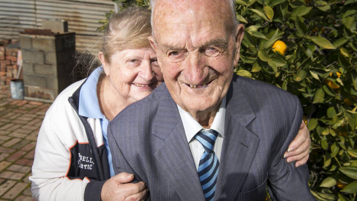 Harold Toma with daughter Judy on his 100th birthday. Picture: DARREN HOWE