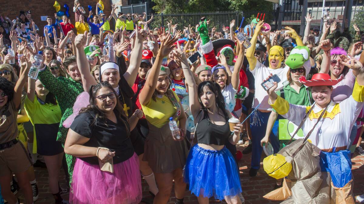 FOND FAREWELL: Bendigo Senior Secondary College students celebrate the end of school last week. Picture: DARREN HOWE