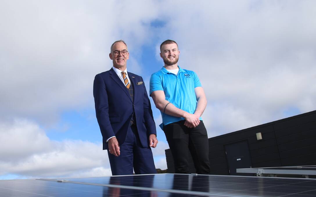 Rob Stephenson with a student in 2019. Picture: GLENN DANIELS