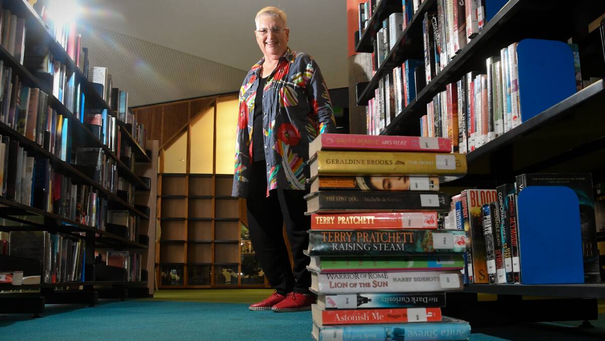 NEW PERSPECTIVES: Librarian Vivien Newton believes different types of books can open all sorts of doors. Picture: NONI HYETT