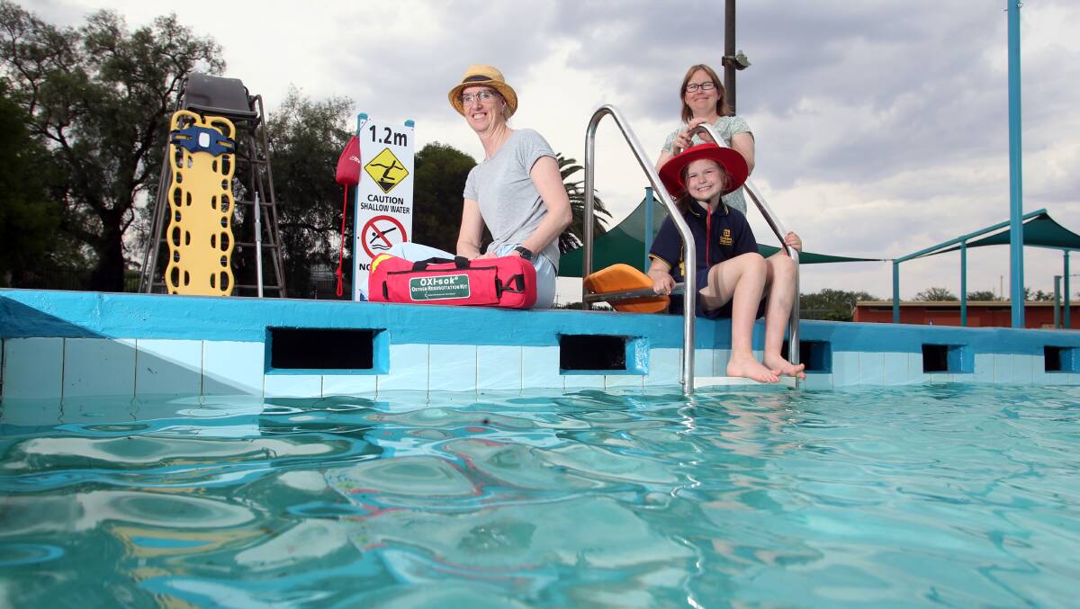 Volunteers at the Golden Square Pool. Picture: GLENN DANIELS
