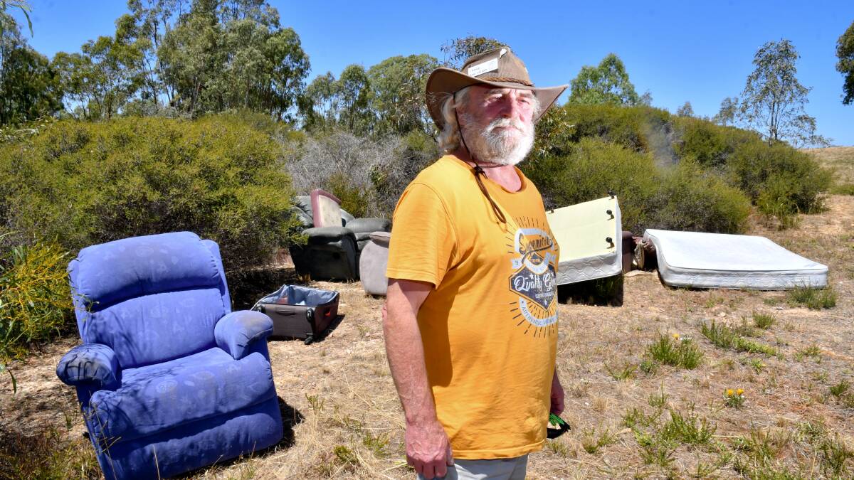 SAD SITE: Ian Logan has been disappointed to find household goods dumped in Golden Square. Picture: NONI HYETT