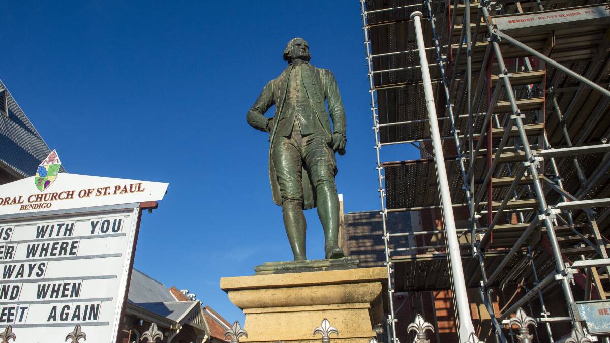 CONTROVERSIAL MONUMENT: A statue of Captain James Cook outside Bendigo's St Paul's Cathedral. Picture: DARREN HOWE