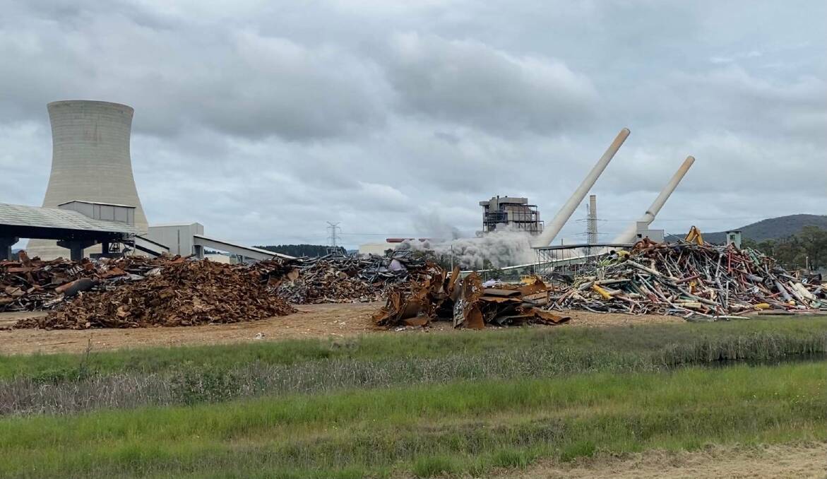 FALLING: The smoke stacks and boiler have been demolished at the Wallerawang Power Station near Lithgow. Picture: ALANNA TOMAZIN