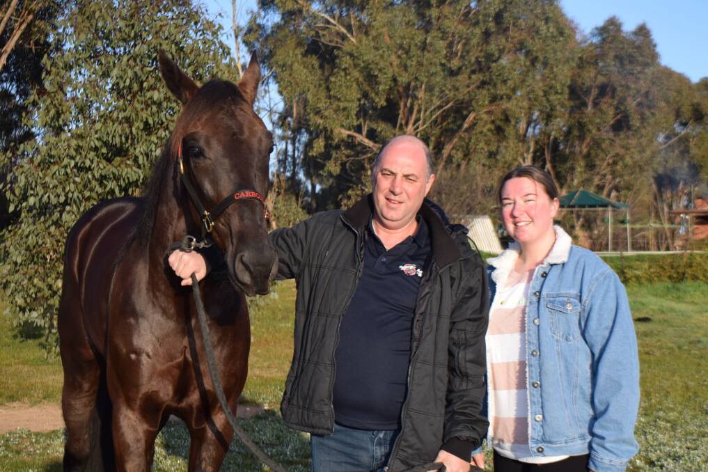 Axedale trainer Mick Carbone and daughter Stacie with Lets Make Tracks. Picture: KIERAN ILES