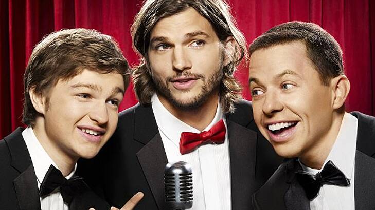 Angus T. Jones, left, with Ashton Kutcher and Jon Cryer in a promotional image for <i>Two and a Half Men</i>.