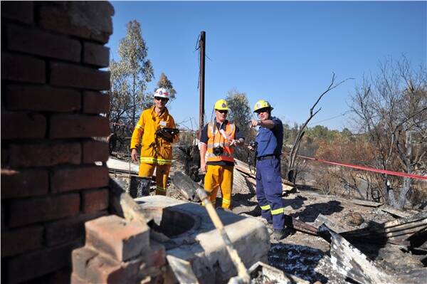 FACT FINDING: Mark Klop and David Castellar from the Tasmanian Fire Service and Heath Langdon from the NSW Fire Brigade tour Bendigo’s bushfire sites.